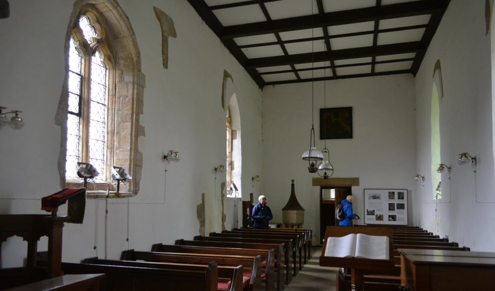 Looking west down the nave to the entrance of St Oswald's Church, Thornton Steward Jervaulx Abbey circular walk