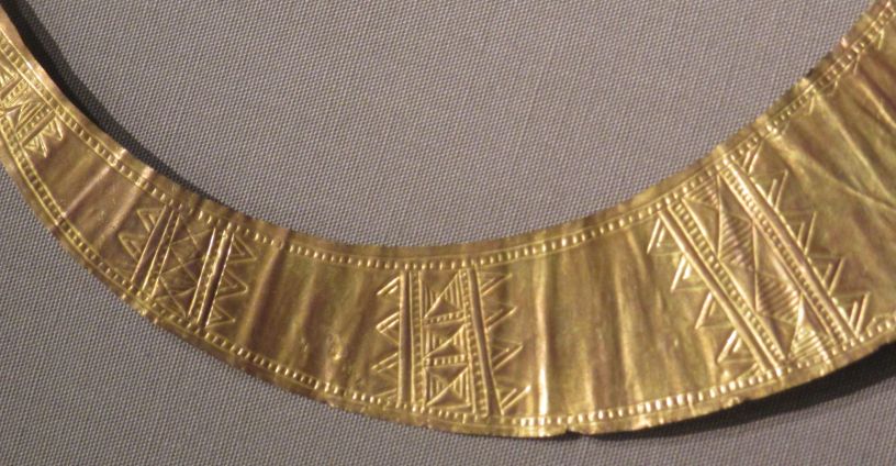 Gold lunula geometrical engravings in detail National Museum Ireland Archaeology Dublin