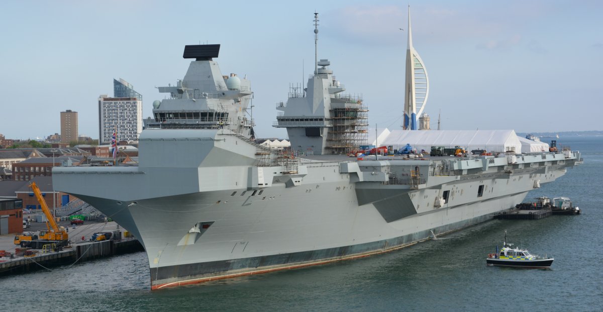Aircraft carrier Royal navy warship R08 HMS QUEEN ELIZABETH in Portsmouth Harbour Portsmouth to Santander Brittany Ferries