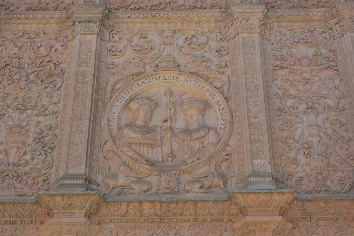 The medallion of Ferdinand II and Isabella I on the facade of the University entrance in Salamanca, Spain