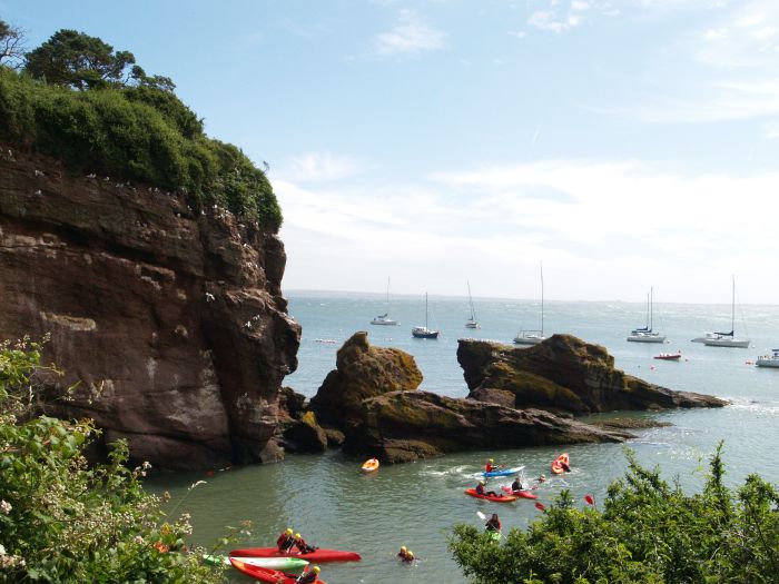 Canoeists in Badgers Cove, Dunmore East Co. Waterford Ireland