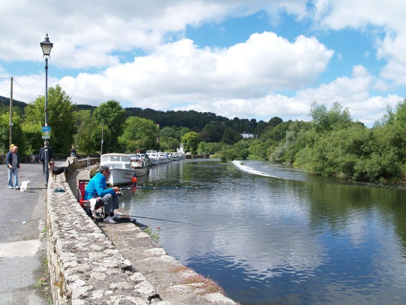 The River Barrow weir and moored boats at Graiguenamanagh Walk from Graiguenamanagh to St Mullins, Co. Kilkenny
