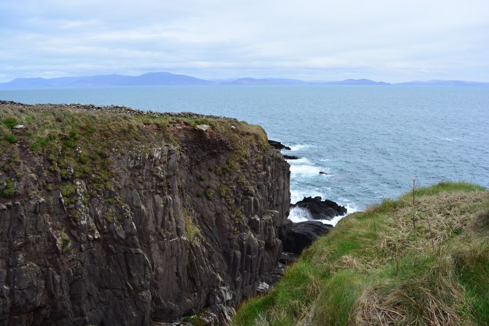 Sheer cliffs below Dunbeg prehistoric fort