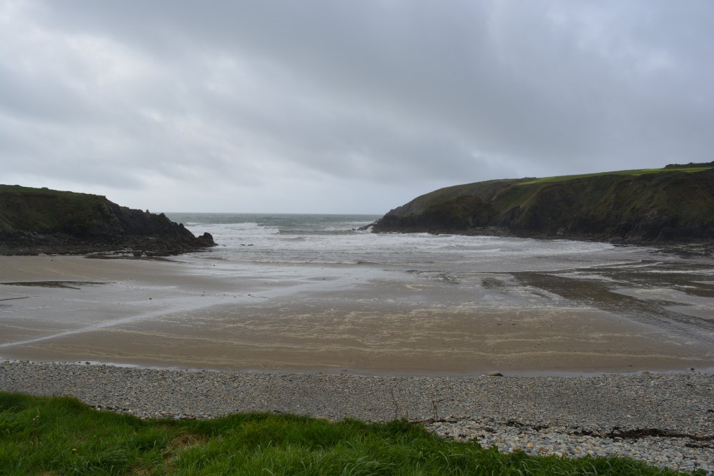 The beach strand at Kilmurrin Cove Copper Coast Drive, Co. Waterford, Ireland