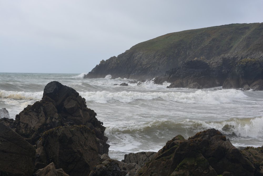Rough seas and waves at Kilmurrin Cove Copper Coast Drive, Co. Waterford, Ireland