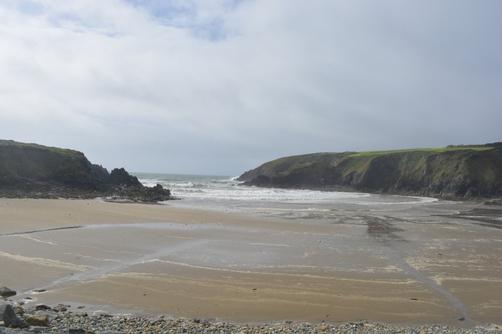 There is a nice sandy beach and safe bathing at the strand of Kilmurrin Cove Copper Coast Drive, Co. Waterford, Ireland