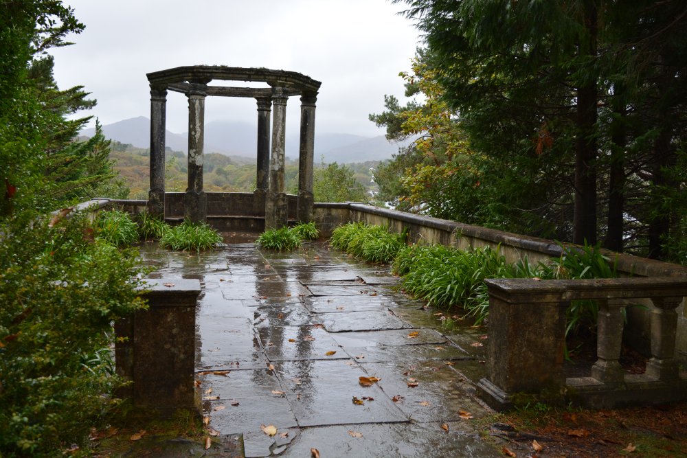 The Grecian Temple, a roofless rotunda overlooking the sea and Caha Mountains Garinish Island, Garnish Island Co. Cork. Ireland