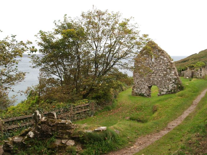 The ruins by St Declan's Well, nicely situated overlooking Ardmore Bay, on the footpath of St Declan's Way. The ruins were once part of an ancient hermitage and medieval 12th century church. Ardmore, Co. Waterford, Ireland