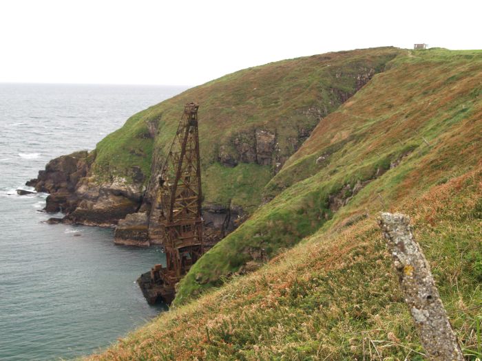 A strange rusting structure, the curious wreck of the Samson crane barge which ran aground in 1987 off Rams Head near Ardmore Ardmore, Co. Waterford, Ireland