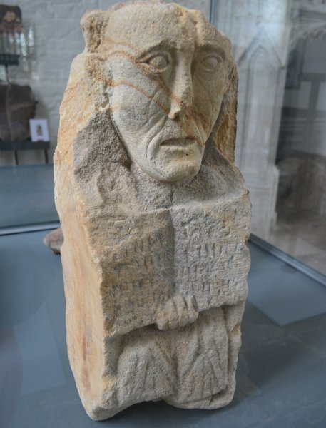 A medieval carved figure in the nave of St Carthage Cathedral, Town of Lismore, Co. Waterford, Republic of Ireland