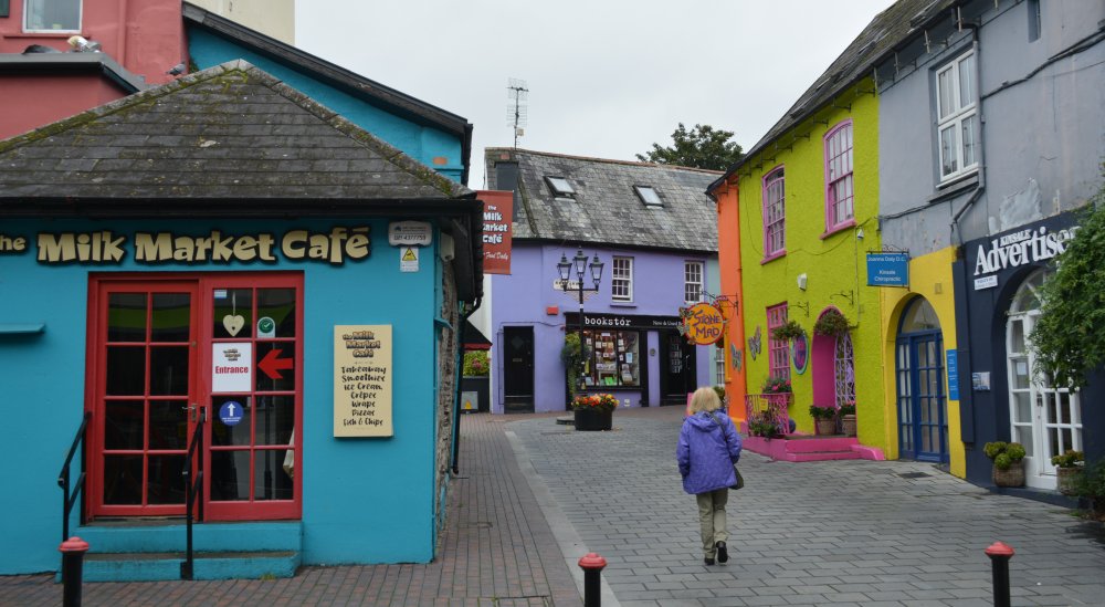 Some typically coloured houses and shops in the streets of Kinsale, Milk Market Cafe Bookstor, Co. Cork, West of Ireland