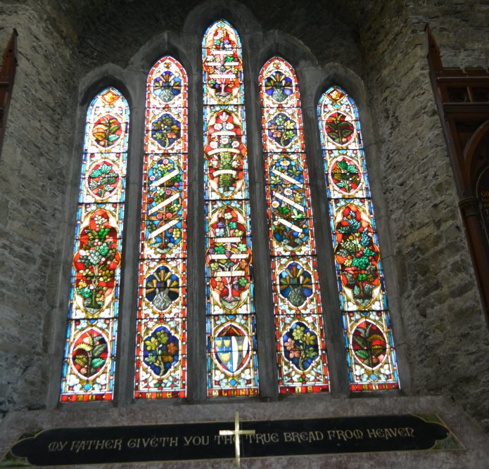 Stained glass window above the altar of St Multose Church Kinsale Co. Cork Ireland medieval building