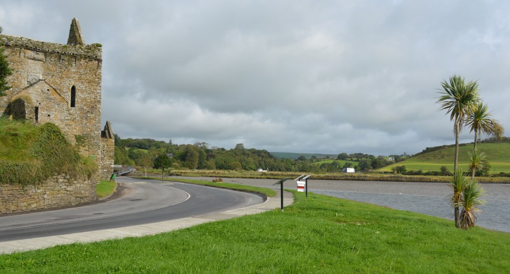The R601 road sweeps by Timoleague Friary at the head of Courtmacsherry Bay Timoleague Friary, Co. Cork, West of Ireland