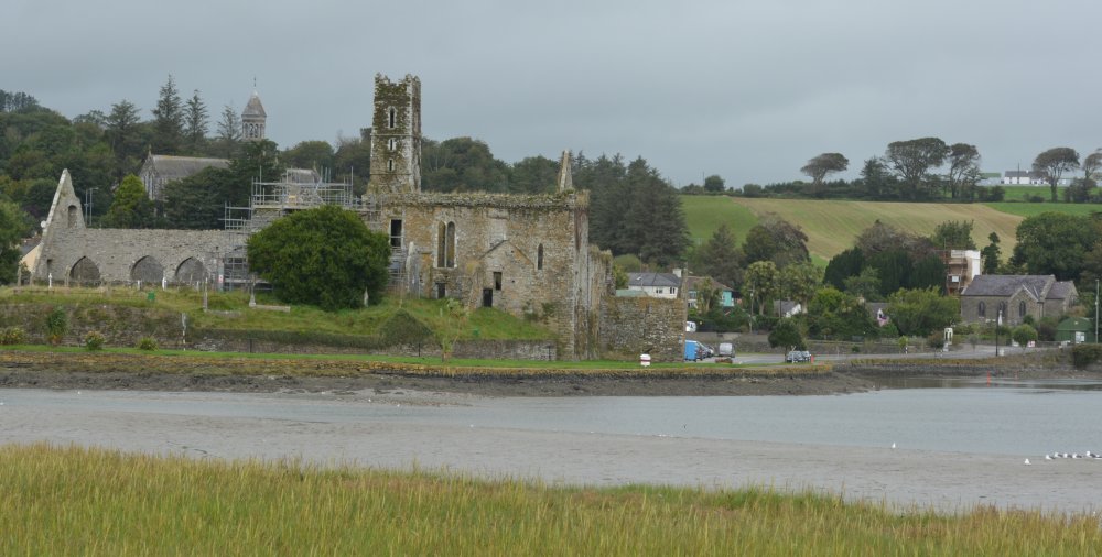 A general view of Timoleague Friary from across the Argideen River Courtmacsherry Bay Timoleague Friary, Co. Cork, West of Ireland