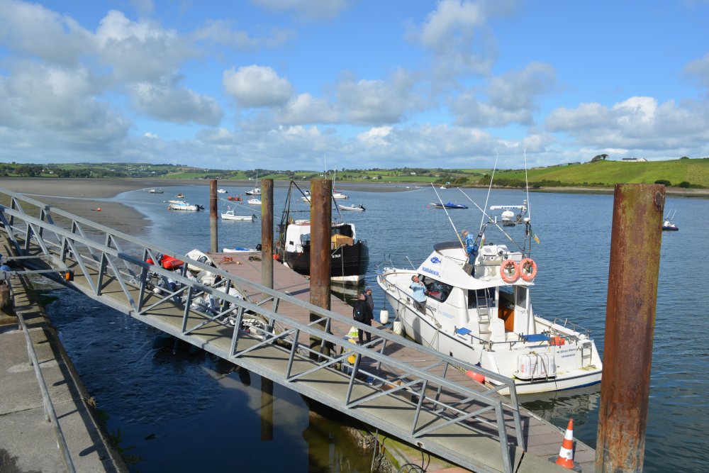 Yachts and motor boats moored by Courtmacsherry harbour Co. Cork, West of Ireland