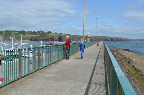 The original east harbour pier wall of Dunmore East, now a safe walkway, Co. Waterford, Ireland