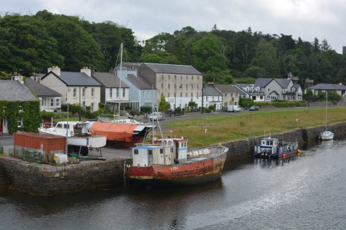 Some old dilapidated fishing boats add a bit of extra character to Newport Harbour quayside Newport, Co. Mayo, Ireland