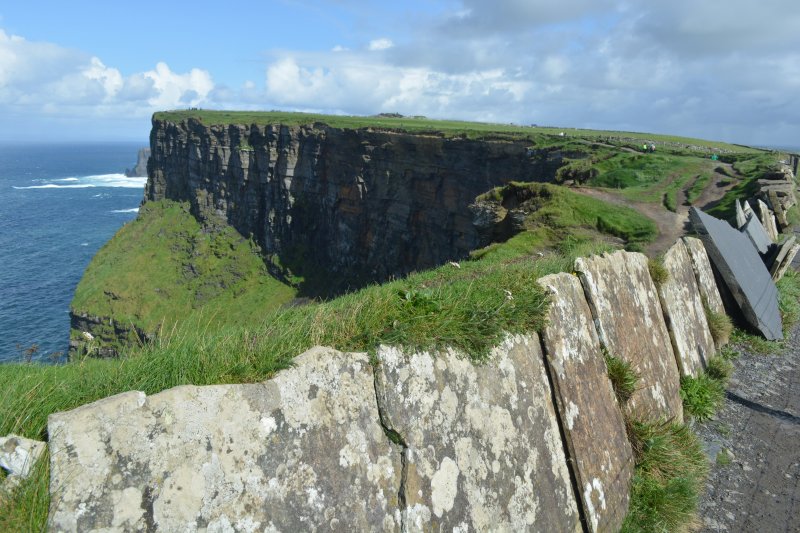 The paved protective walls on the walkway to the fort signal tower Cliffs of Moher, Co. Clare,  Wild Atlantic Way, West of Ireland Coast