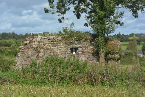 scant ruins of an old building, maybe a fragment of the monastic site Ahenny High Crosses, Co. Tipperary, Ireland
