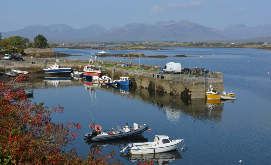 A few small fishing boats and small craft in Roundstone Harbour. Roundstone, Connemara, Co. Galway, Ireland