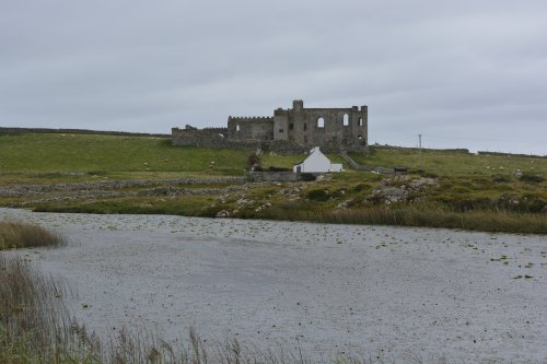 The roofless ruins of Bunowen Castle (also known as O'Flaherty's Castle) located on the Hill of Doon, a much rebuilt medieval castle. Connemara, Co. Galway, Ireland