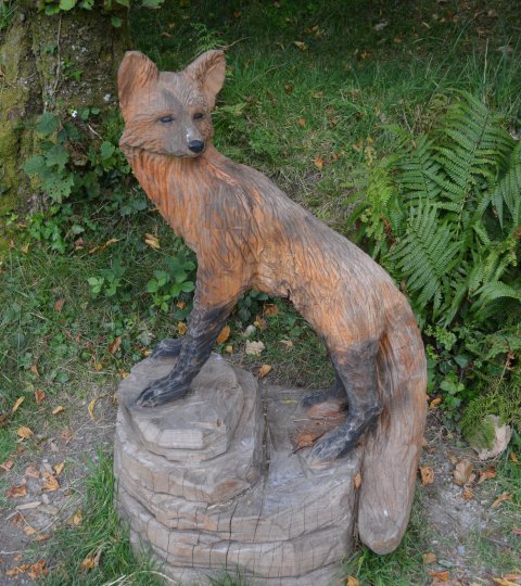 Wooden sculpture of a fox on the way up to Diamond Mountain Connemra National Park Centre, Co. Galway, Ireland