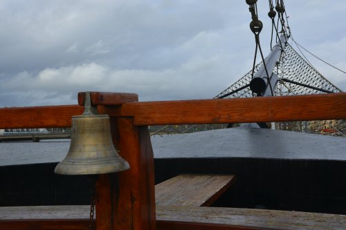 the ship's bell of the Dunbrody replica famine ship museum experience, New Ross, Co. Wexford, Ireland
