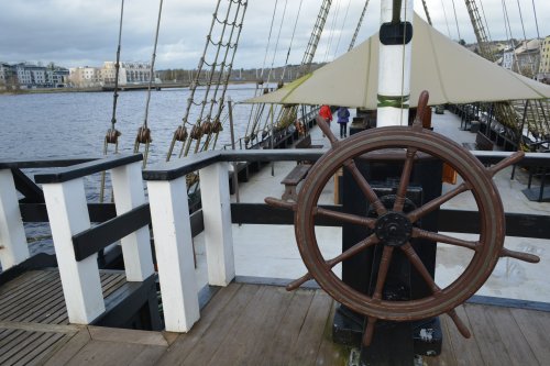 The steering wheel (helm) of the Dunbrody replica famine ship museum experience, New Ross, Co. Wexford, Ireland