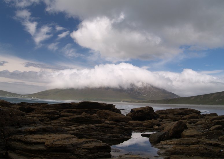 103. Rocks and a cloud covered Slievemore Mountain viewed from Keel Strand, Achill Island, Co. Mayo, Ireland.