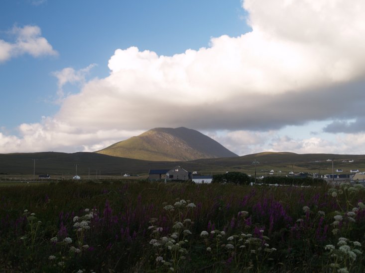 116. A cloud-topped Slievemore Mountain viewed from the west of Dooagh Village, Achill Island, Co. Mayo, Ireland.