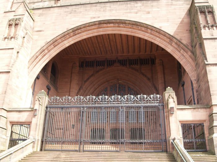 Anglican Cathedral Liverpool The Rankin Porch, steps and iron gates leading up into the central space of the cathedral.