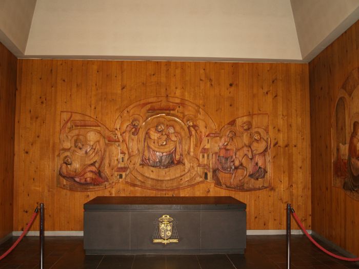 The beautifully carved and 'lightly' painted wooden panels and stone altar in St Joseph's Chapel RC Roman Catholic Cathedral Liverpool