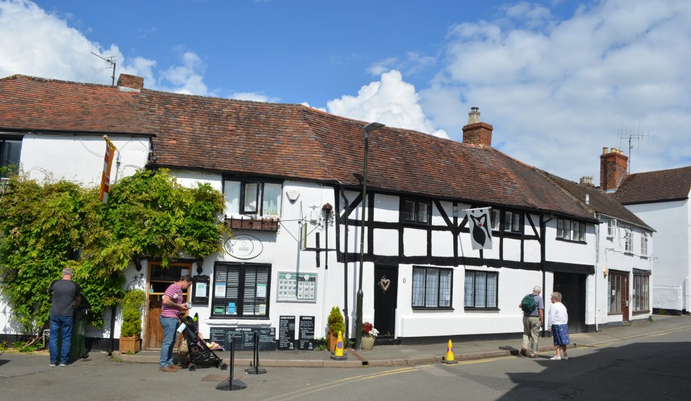 Ice Cream Cottage at Crumpets, No 6 St Mary's Lane owl sign Tewkesbury market town Gloucestershire England