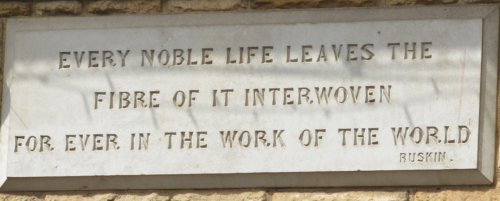 stone plaque above the entrance to the Mann Institute Moreton-in-Marsh market town Cotswolds Gloucestershire England