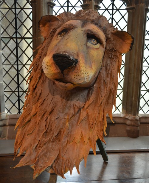 Aslan was the lion character in the CS Lewis book, the The Lion, the Witch and the Wardrobe Great Malvern Priory Church Worcestershire England