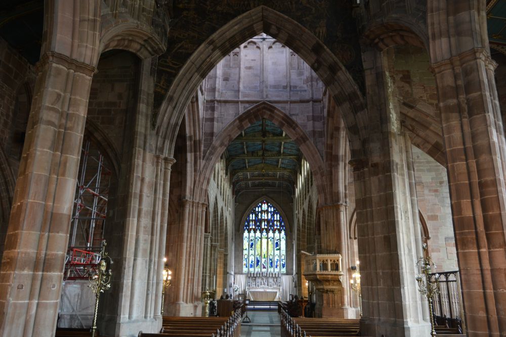 Looking down the nave to the great east window of Holy Trinity Parish Church City of Coventry