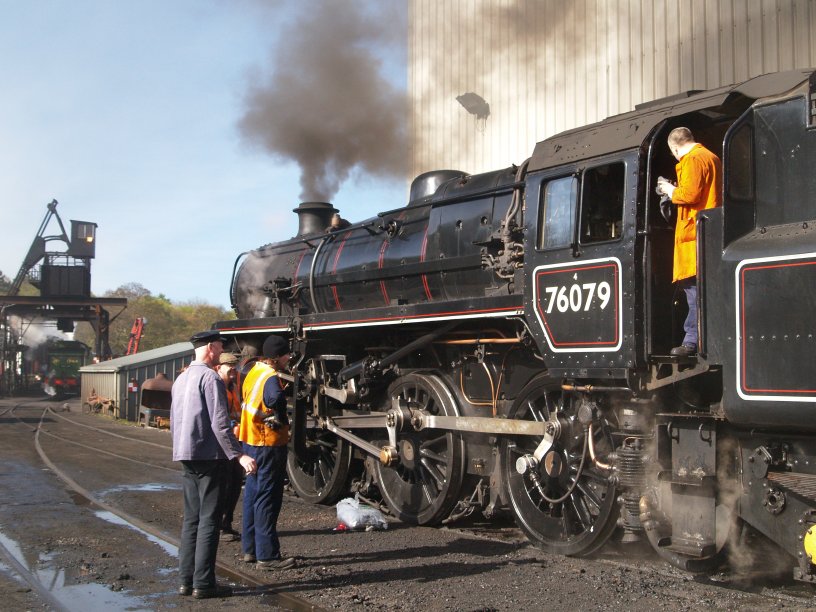 BR standard locomotive 76079 being prepared for duty in the early morning at Grosmont shed