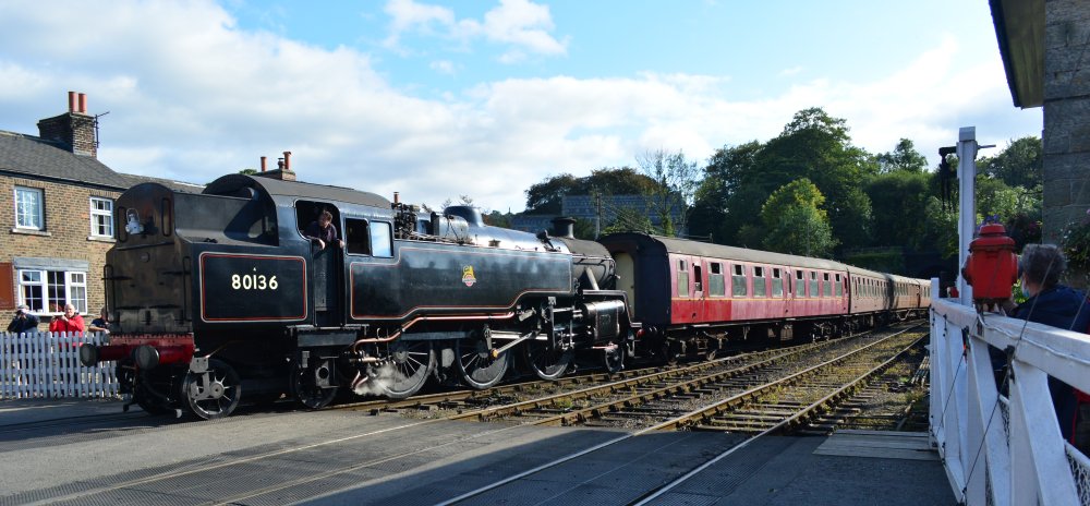 Entering Grosmont station with a train from Pickering, BR standard 4MT 2-6-4T tank engine 80136, NYMR Steam Gala September 2021