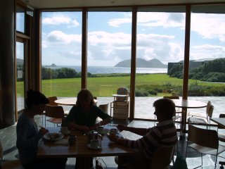 The setting of the cafe of the Blasket Island Interpretive Heritage Centre at Dunquin, Co. Kerry, Ireland, has a magnificent view across to the Blasket Islands off the Atlantic Coast of the Dingle Peninsular. The islands have been officially uninhabited since 1953, but the once thriving small community left a wealth of literature.