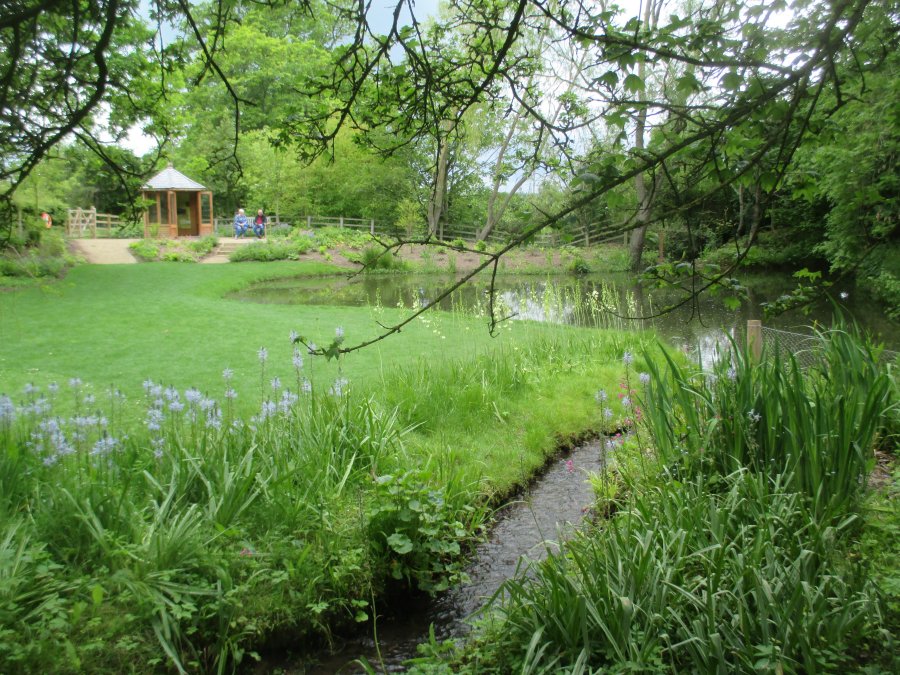 summer house, pond and stream in the gardens of Mount Grace Priory, North Yorkshire