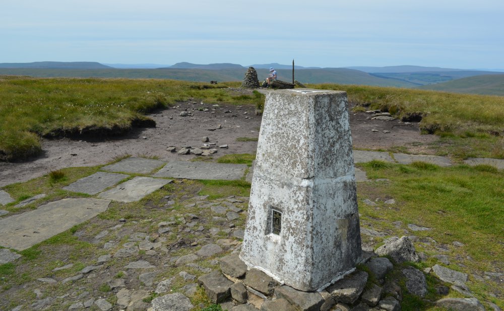 The trig point and cairn on the top of Buckden Pike Linear walk up Buckden Pike, Yorkshire Dales National Park, North Yorkshire