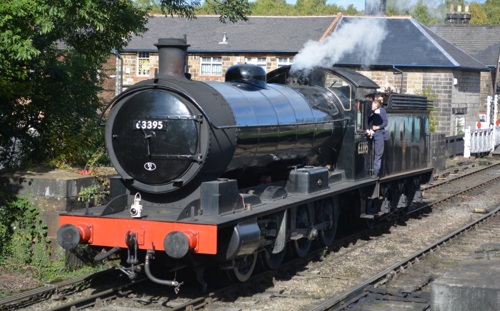 Portrait of 0-8-0 freight locomotive Ex NER 2238, LNER 3395, BR Q6 steam locomotive 63395 in BR black livery shed code 51A Darlington