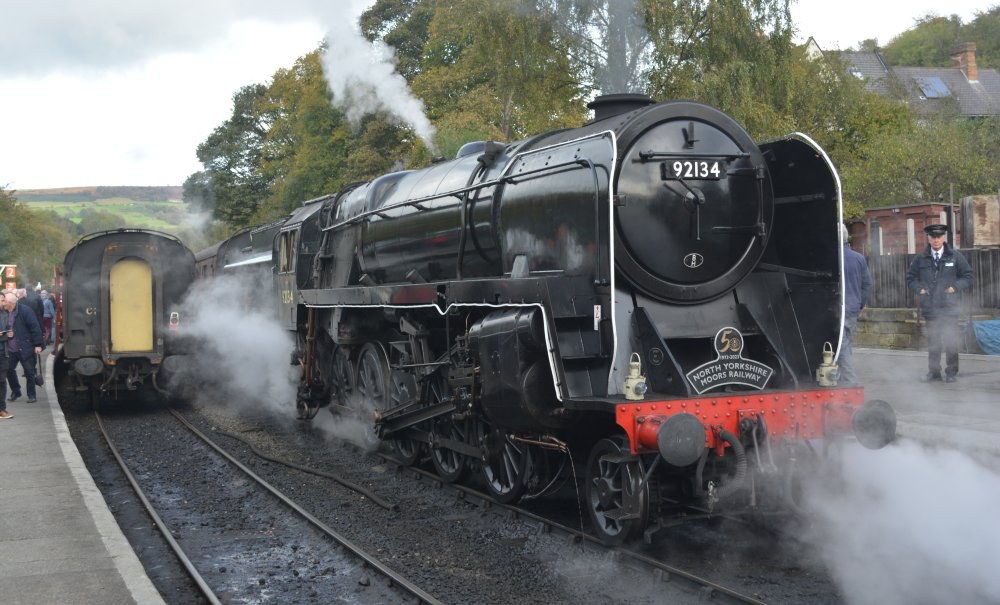 British Railway 9F 2-10-0 freight steam locomotive standing in Grosmont Station on the North Yorkshire Moors Railway (Oct. 2023)