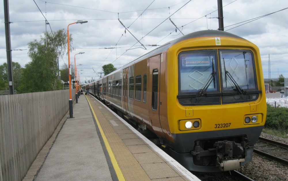 Class 323 EMU unit 323207 at Lichfield Trent Valley station (upper level) with a West Midlands Trains service to Bromsgrove