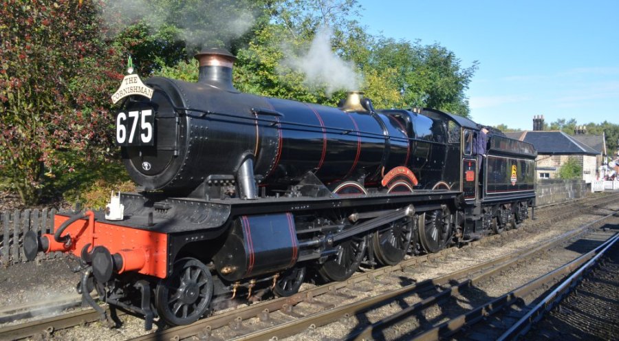 North Yorkshire Moors Railway: Portrait of GWR Hall Class steam locomotive 4953 PITCHFORD HALL in British Railways black livery and carrying the headboard THE CORNISHMAN, NYMR Autumn Steam Gala 2024